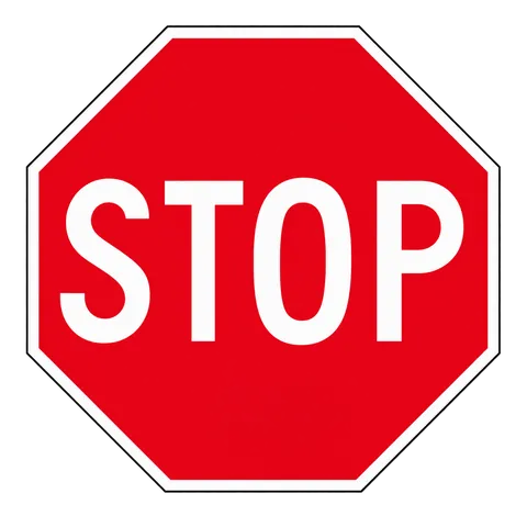 A stop sign is eight-sided and has a red background with white letters